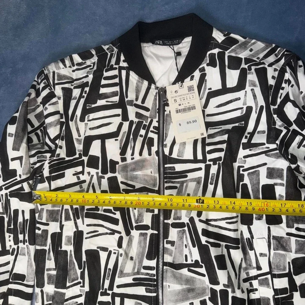 Black and white abstract brushstroke print bomber jacket